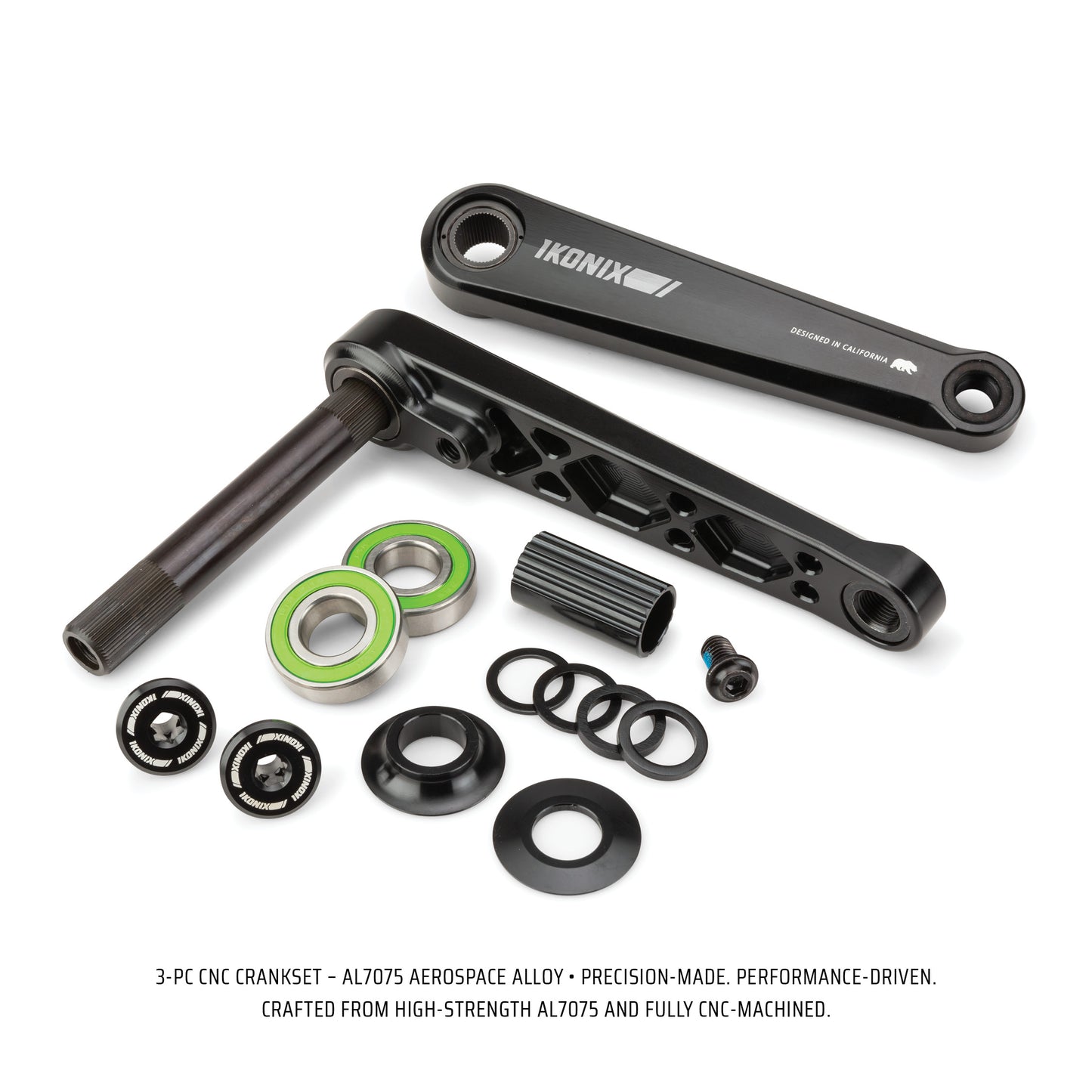 Complete IKONIX BMX bicycle crankset with bearings and washers on a white background